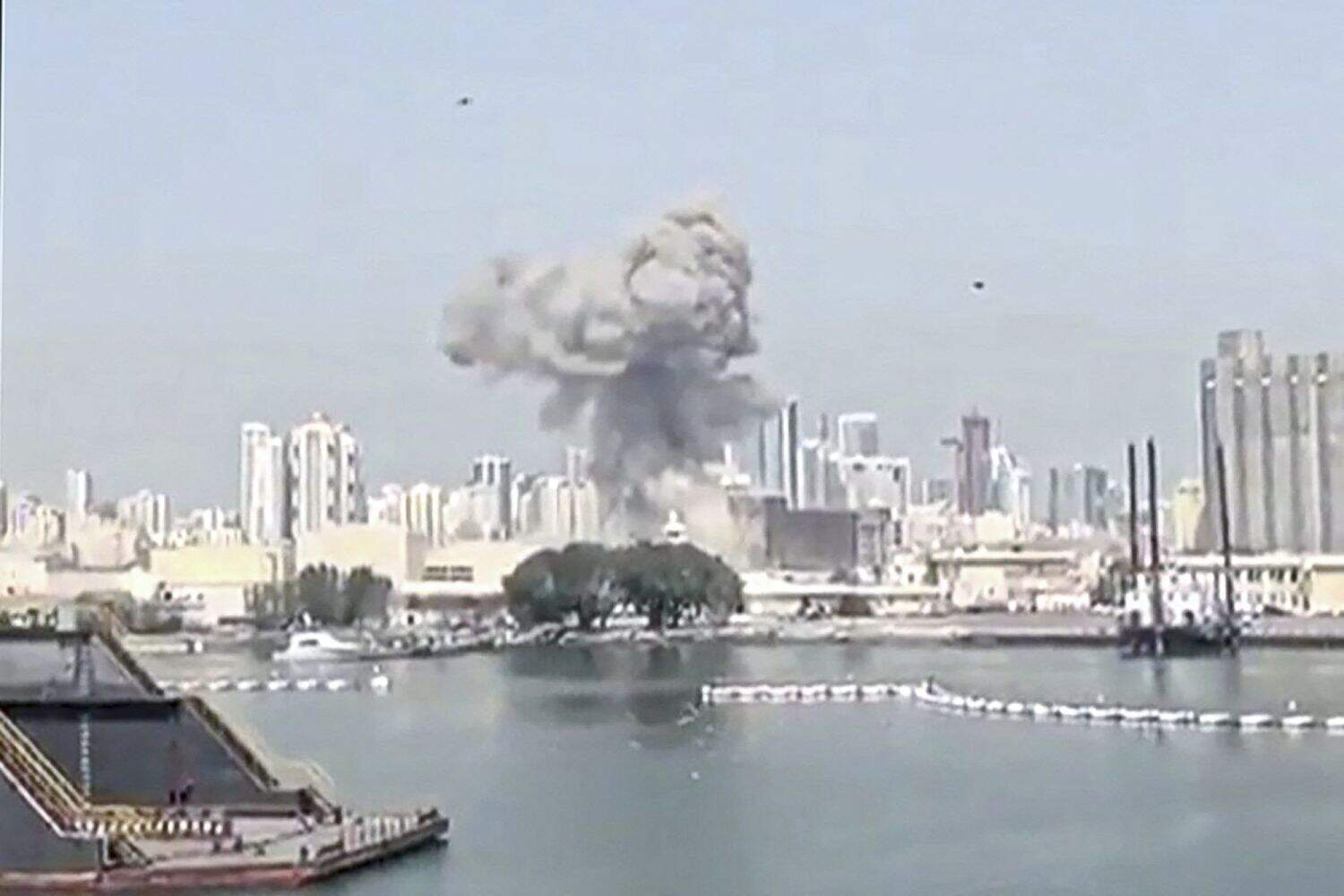 This video grab taken from UGC images posted on social media on February 28, 2026, and verified by AFPTV teams in Paris, shows the moment of a strike on a U.S. base in Bahrain. Iran's Revolutionary Guards said on February 28 that they had targeted the US Fifth Fleet in Bahrain, after the Gulf state said the American base had been hit by a missile attack, according to a statement carried by local media. Picture: various sources / AFP