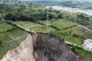 A sinkhole approximately 100 meters deep formed as a result of a ground collapse in Indonesia