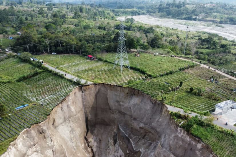 A sinkhole approximately 100 meters deep formed as a result of a ground collapse in Indonesia