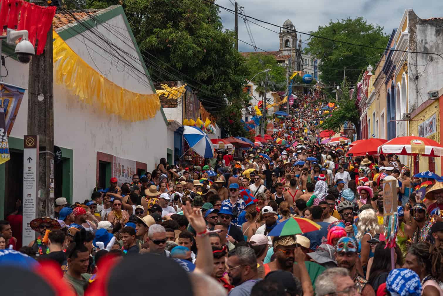 Revelers attend a carnival street party in Olinda