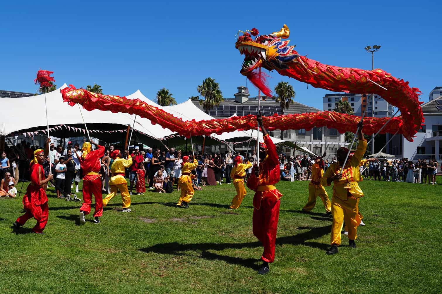 Local performers perform a dragon dance