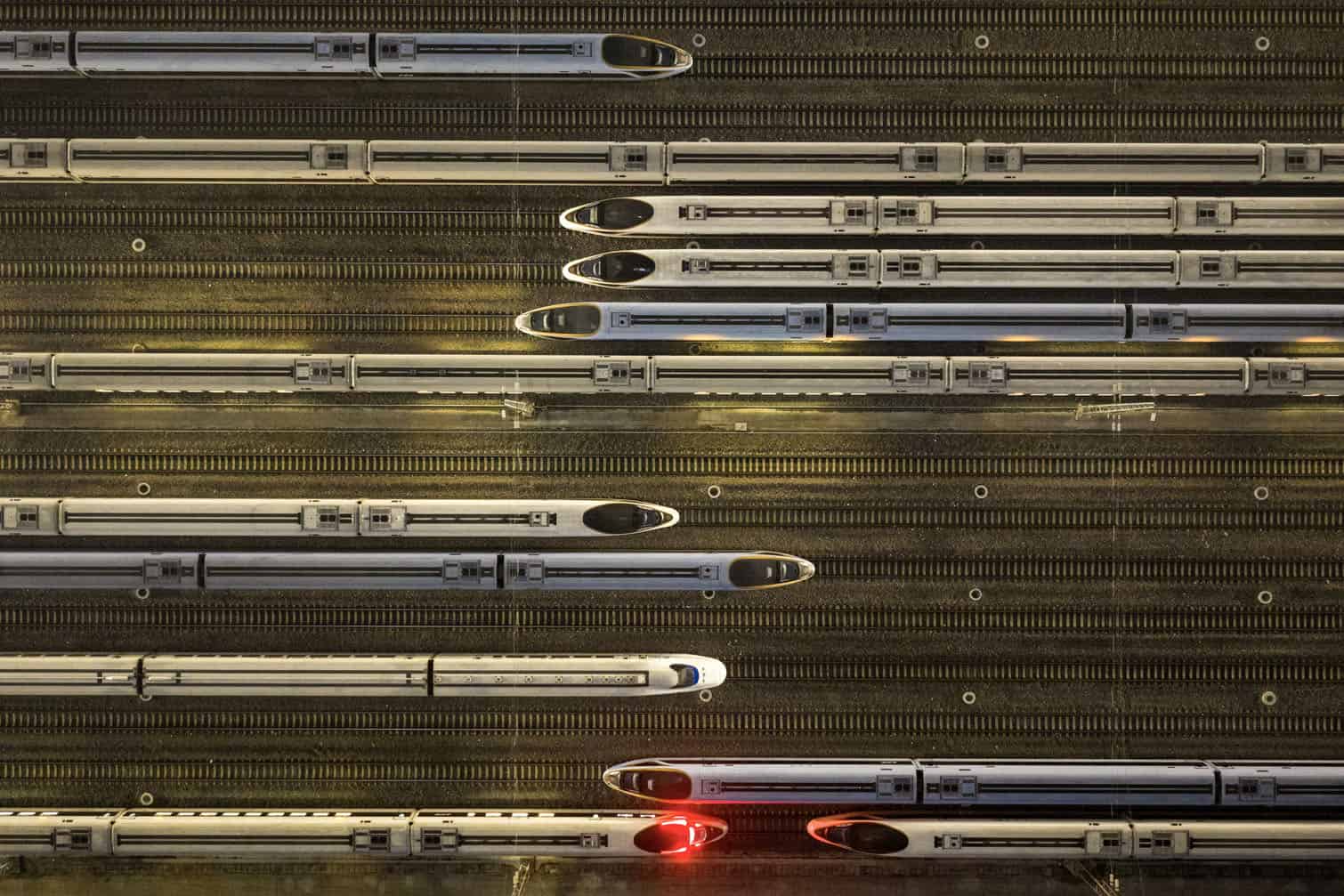 High-speed trains are seen at a train station