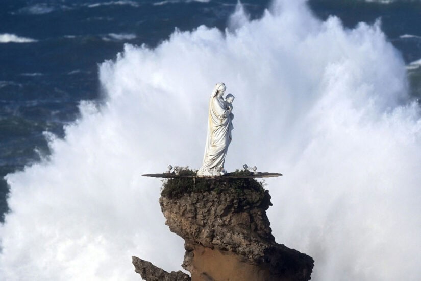 Waves crash at the Rock of the Virgin