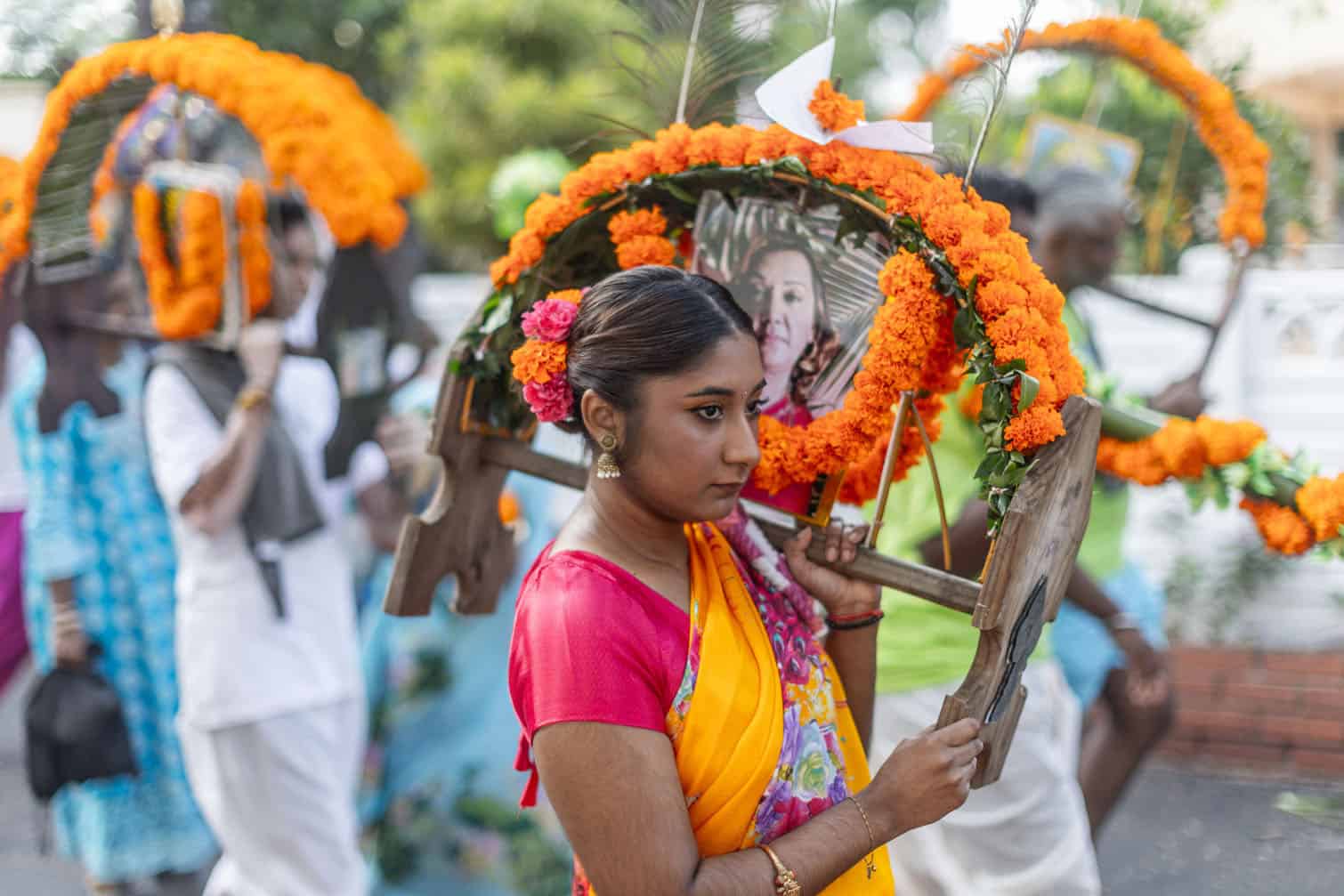 A Hindu devotee carries a 'kavadi'