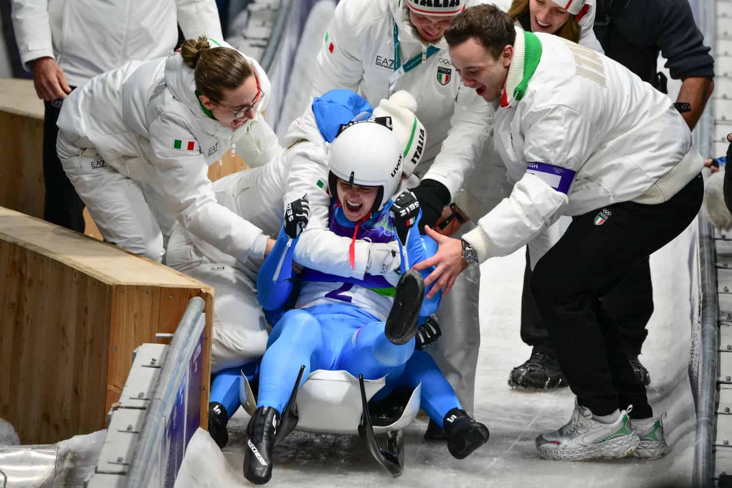 Italy's Andrea Voetter and Marion Oberhofer celebrate