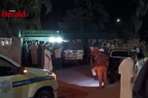 Worshippers outside the mosque after the incident.