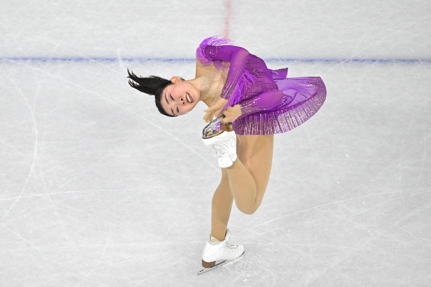 Japan's Mone Chiba competes in the figure skating