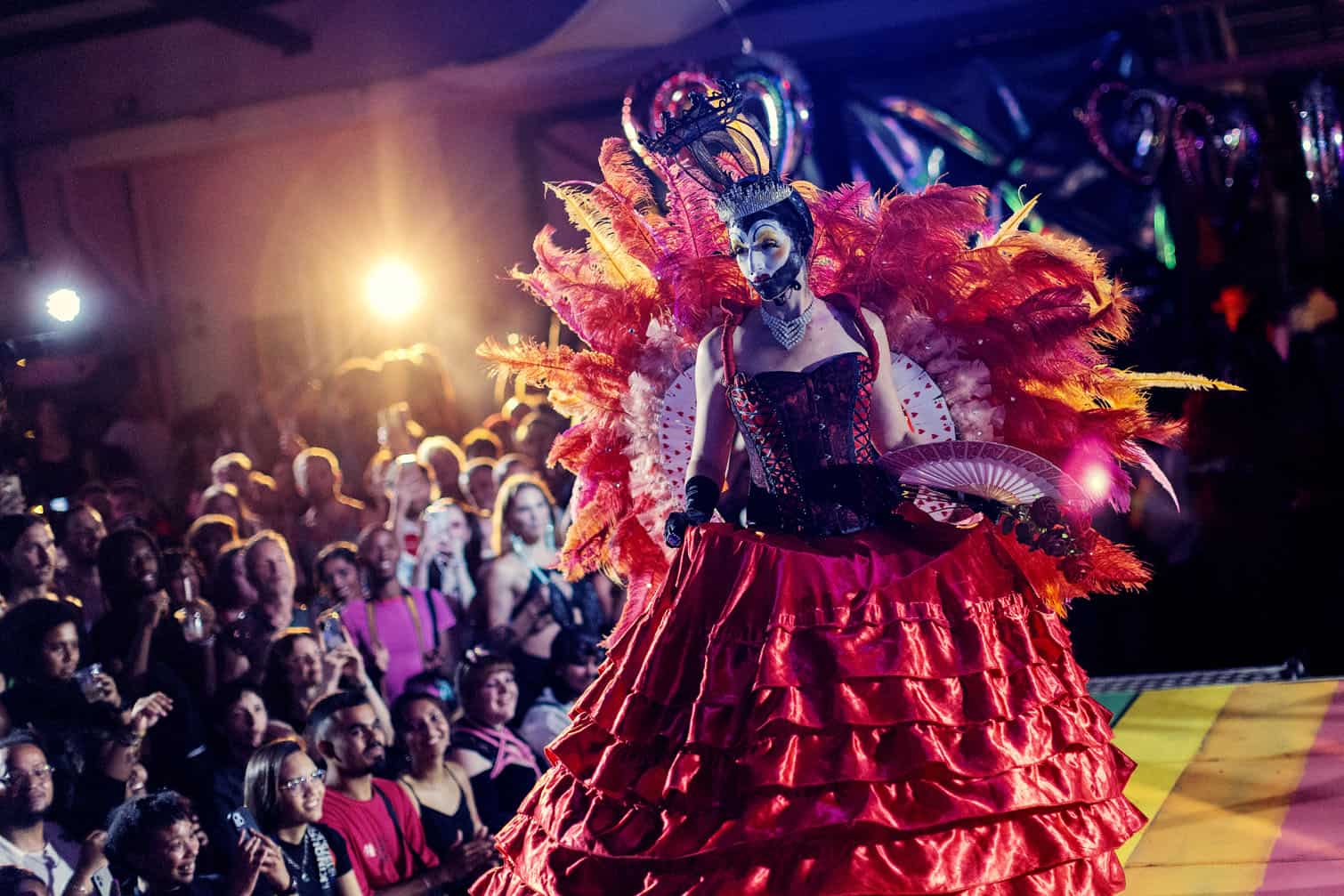 A participant walks the runway during competitions at the Love Pride Ball