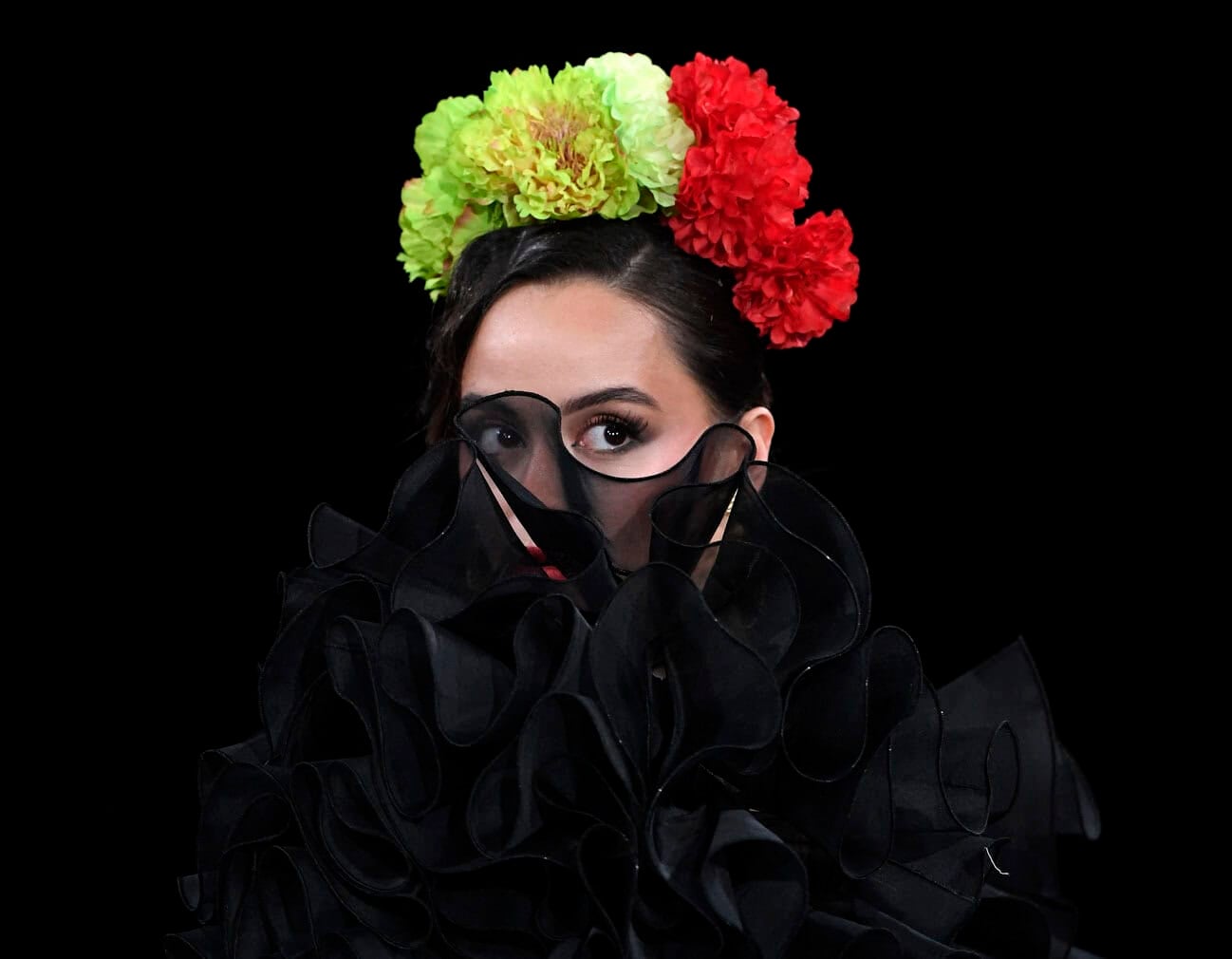 A model presents a creation by Yolanda Rivas