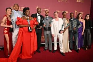 Chinese-US actress Li Jun Li, US actor Omar Miller, Nigerian-British actor Wunmi Mosaku, British actor Delroy Lindo, US actor Michael B. Jordan, British actor Jack O'Connell, US actress singer songwriter Jayme Lawson, US actor Miles Caton, and US casting director Francine Maisler pose with the Outstanding Performance by a Cast in a Motion Picture for "Sinners" during the 32nd Annual Actor Awards at the Shrine Auditorium in Los Angeles on March 1, 2026. Picture via Frederic J. Brown / AFP