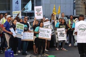 Community activists and eco justice organisations unite in a peaceful demonstration, urging the Court to uphold constitutional and environmental rights amid concerns that the EIA failed to assess unprecedented deep water drilling risks.