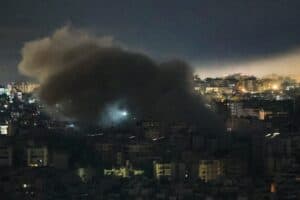 Smoke rises from the site of an Israeli airstrike that targeted an area in Beiruts southern suburbs on March 23, 2026.