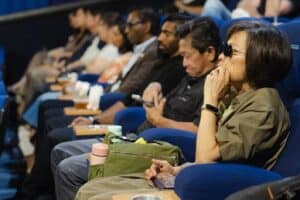 Audiences watch the documentary 'A Chip Odyssey'.