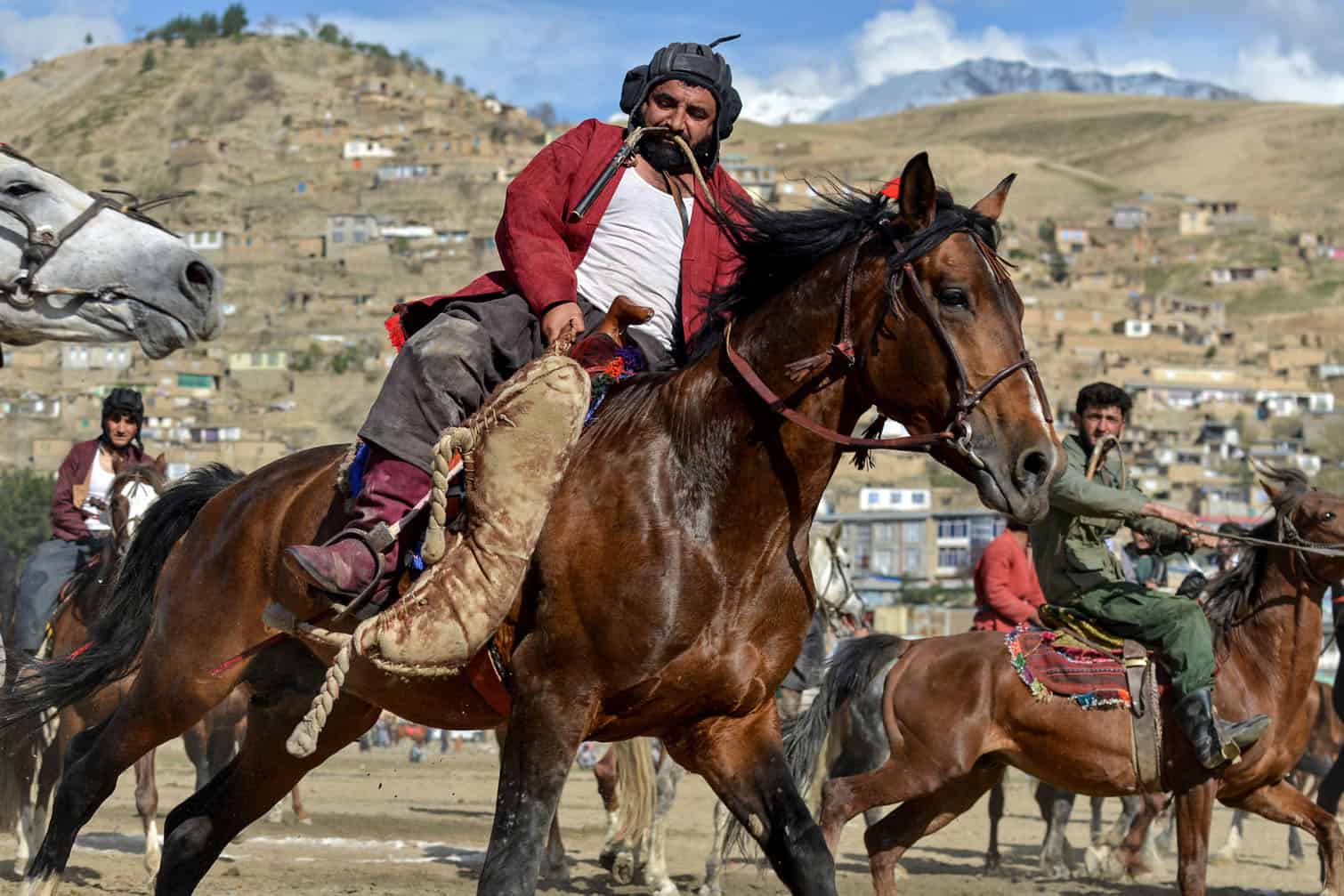 Afghan horse riders compete in Buzkashi