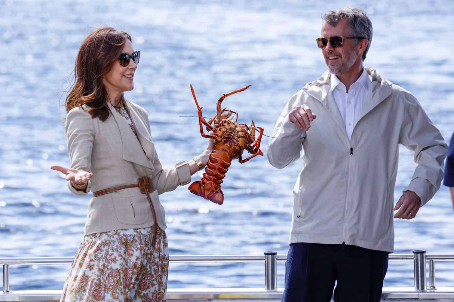 Denmark's King Frederik X and Queen Mary inspect a lobster