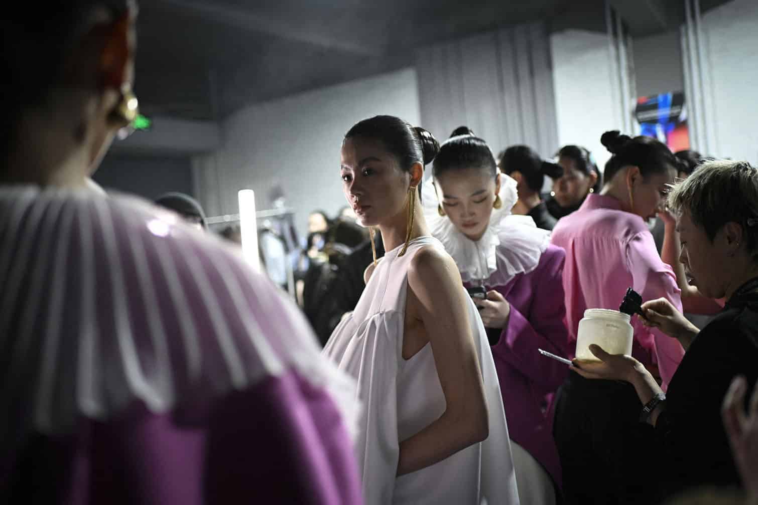 Models prepare backstage