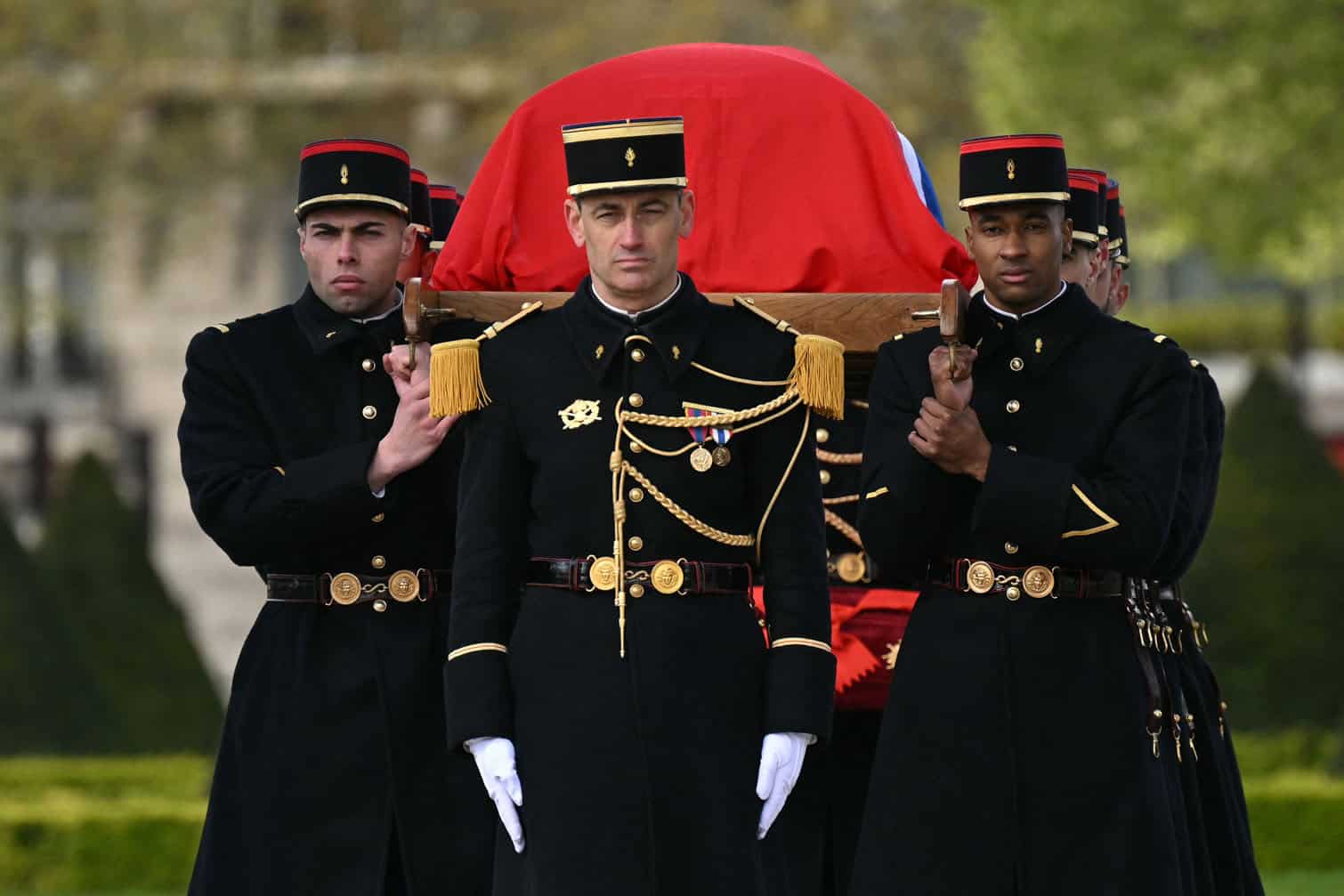French Republican Guards carry the coffin of French Prime Minister Lionel Jospin