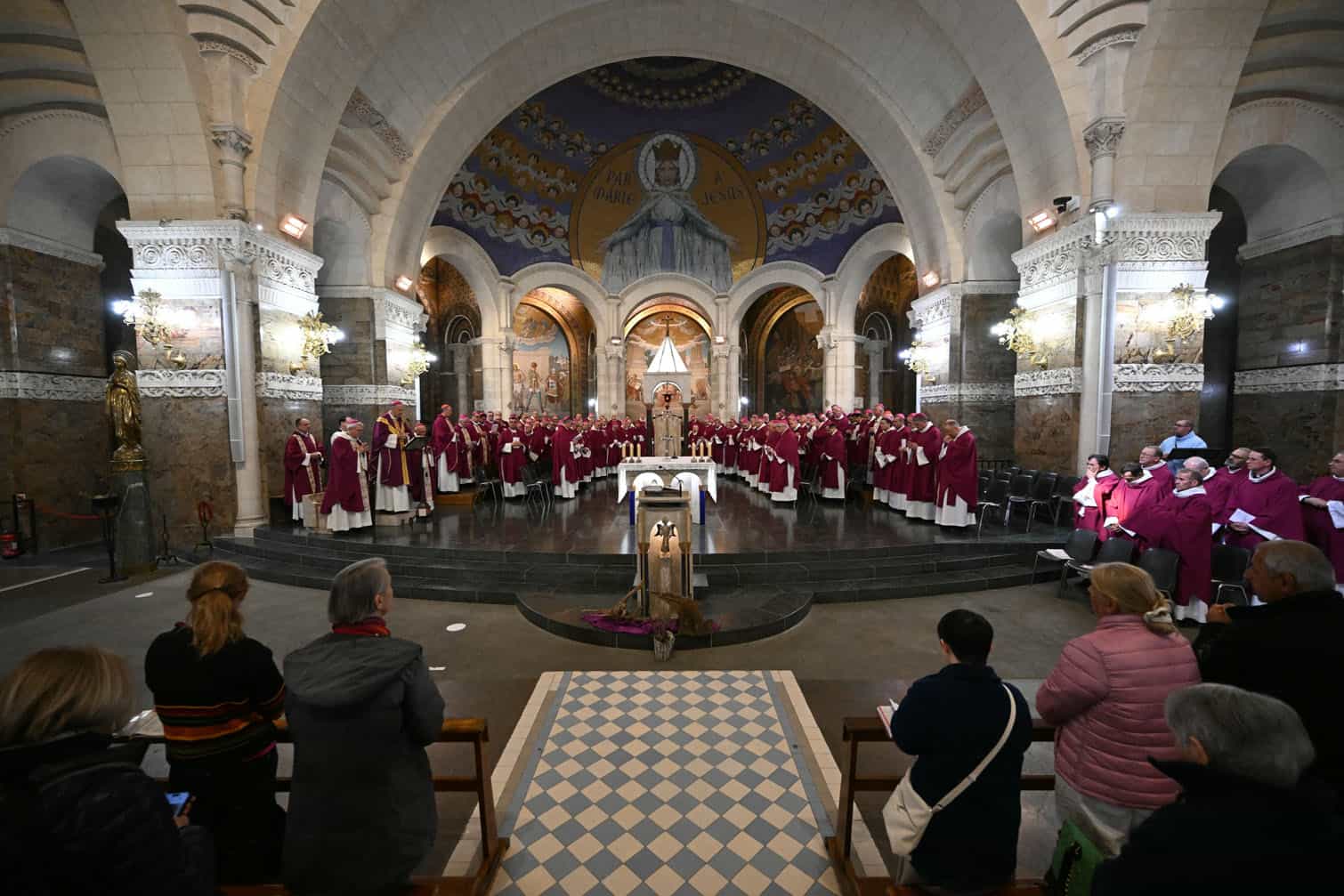 Bishops attend a mass in the Notre-Dame-du-Rosaire-de-Lourdes