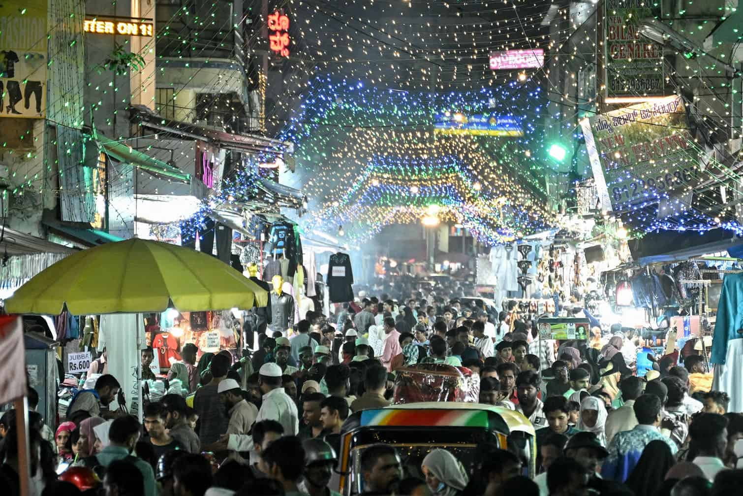 People gather to shop ahead of Eid al-Fitr