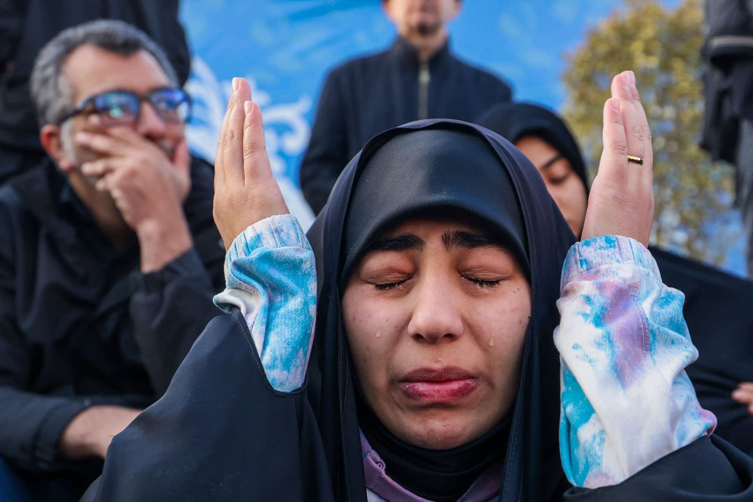 People mourn the death of Iran's supreme leader