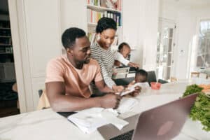 A couple reviewing their finances for the year. Picture for illustration purposes: istock
