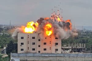 A fireball errupts from the site of an Israeli airstrike