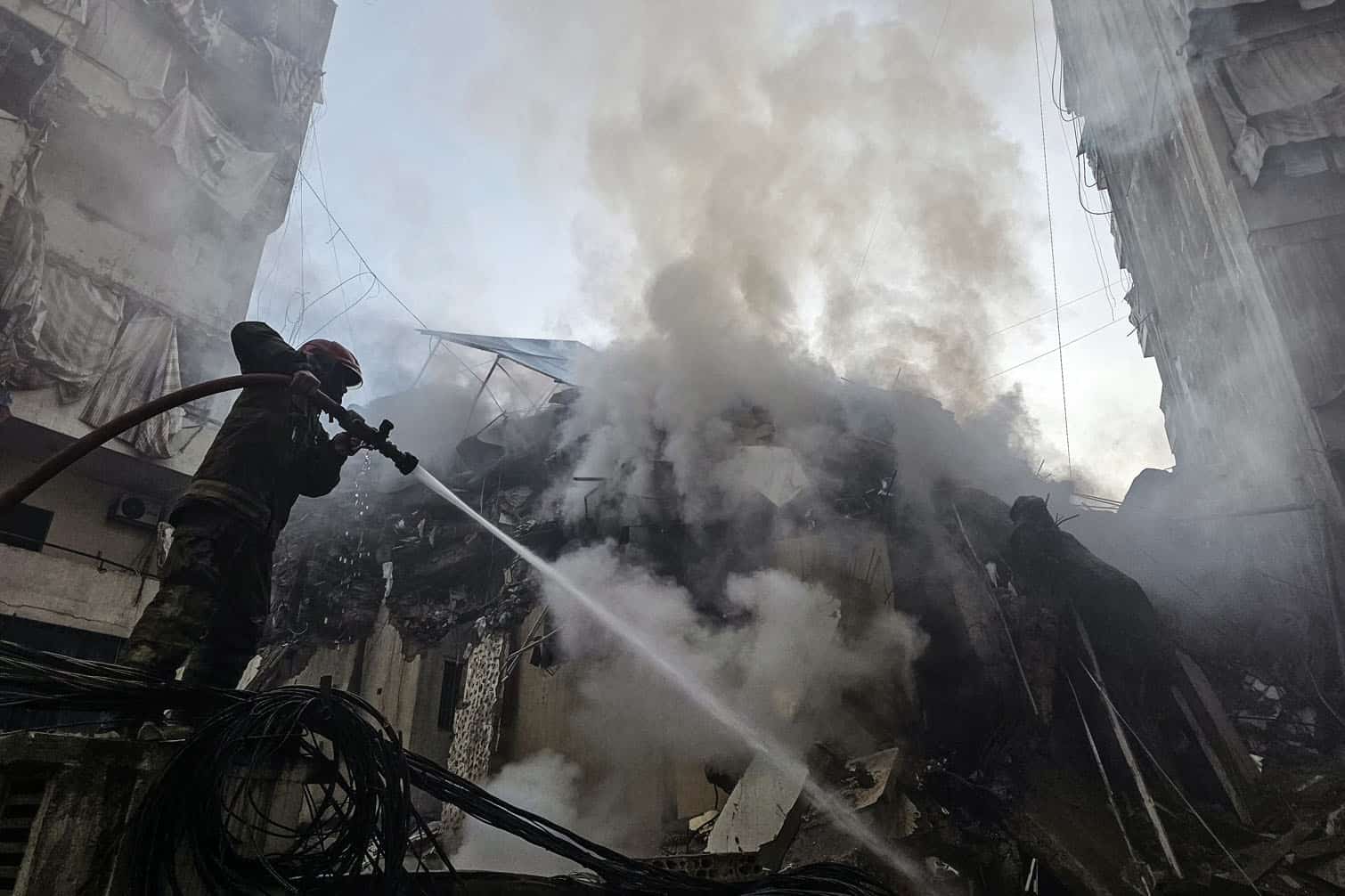 Firefighters extinguish a fire