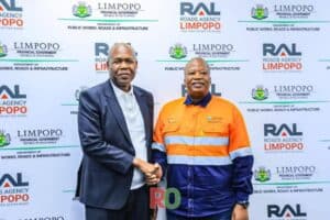 Mayor John Mpe engages in a strategic meeting with MEC Ernest Rachoene.