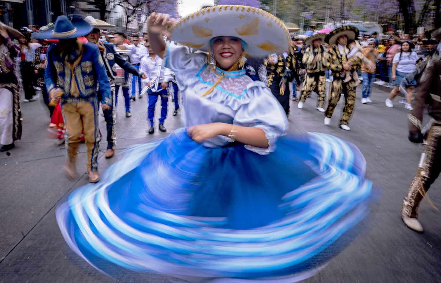 A woman takes part in the annual spring carnival parade