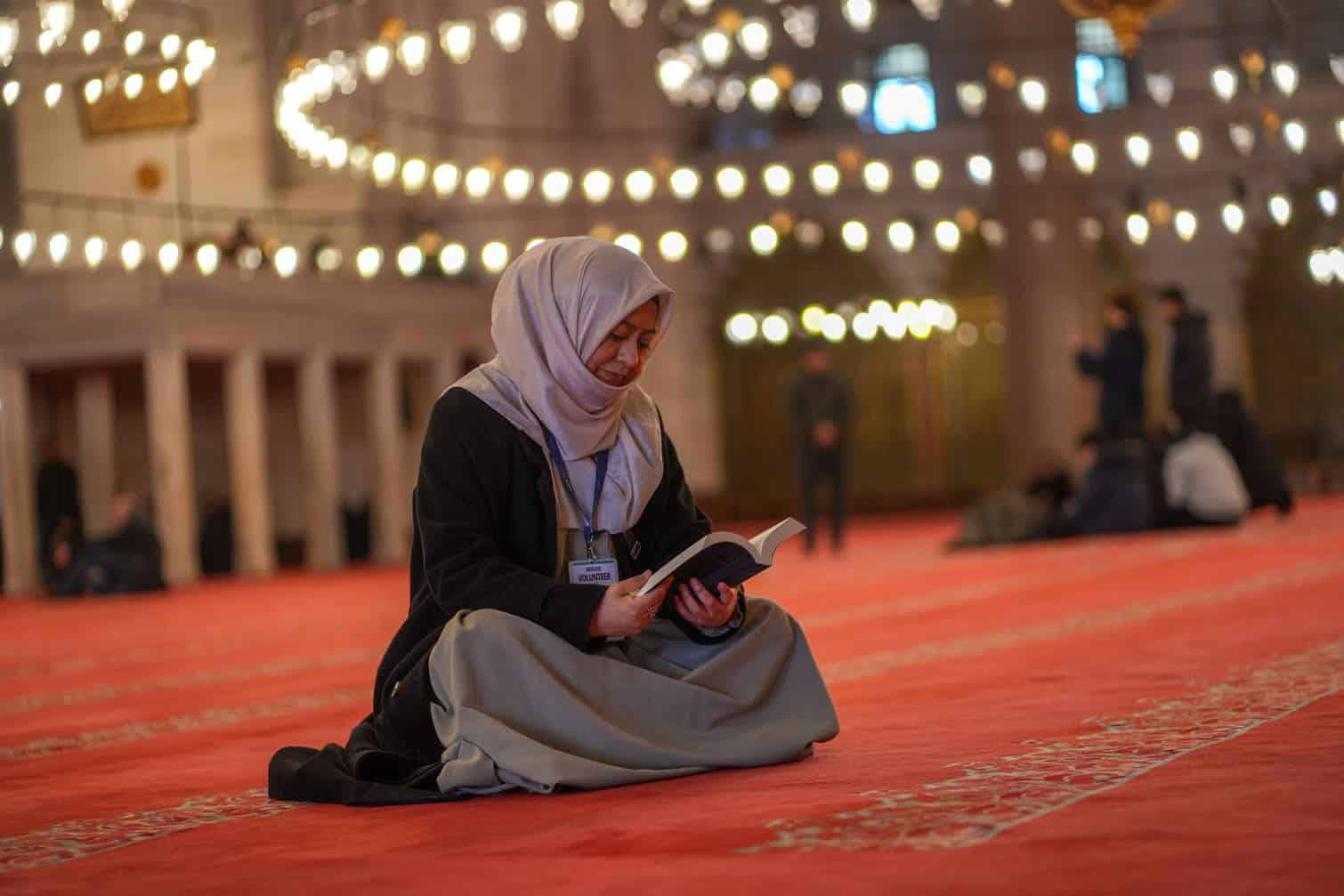 Peruvian convert volunteers at Istanbulâs Suleymaniye Mosque guiding Spanish-speaking visitors