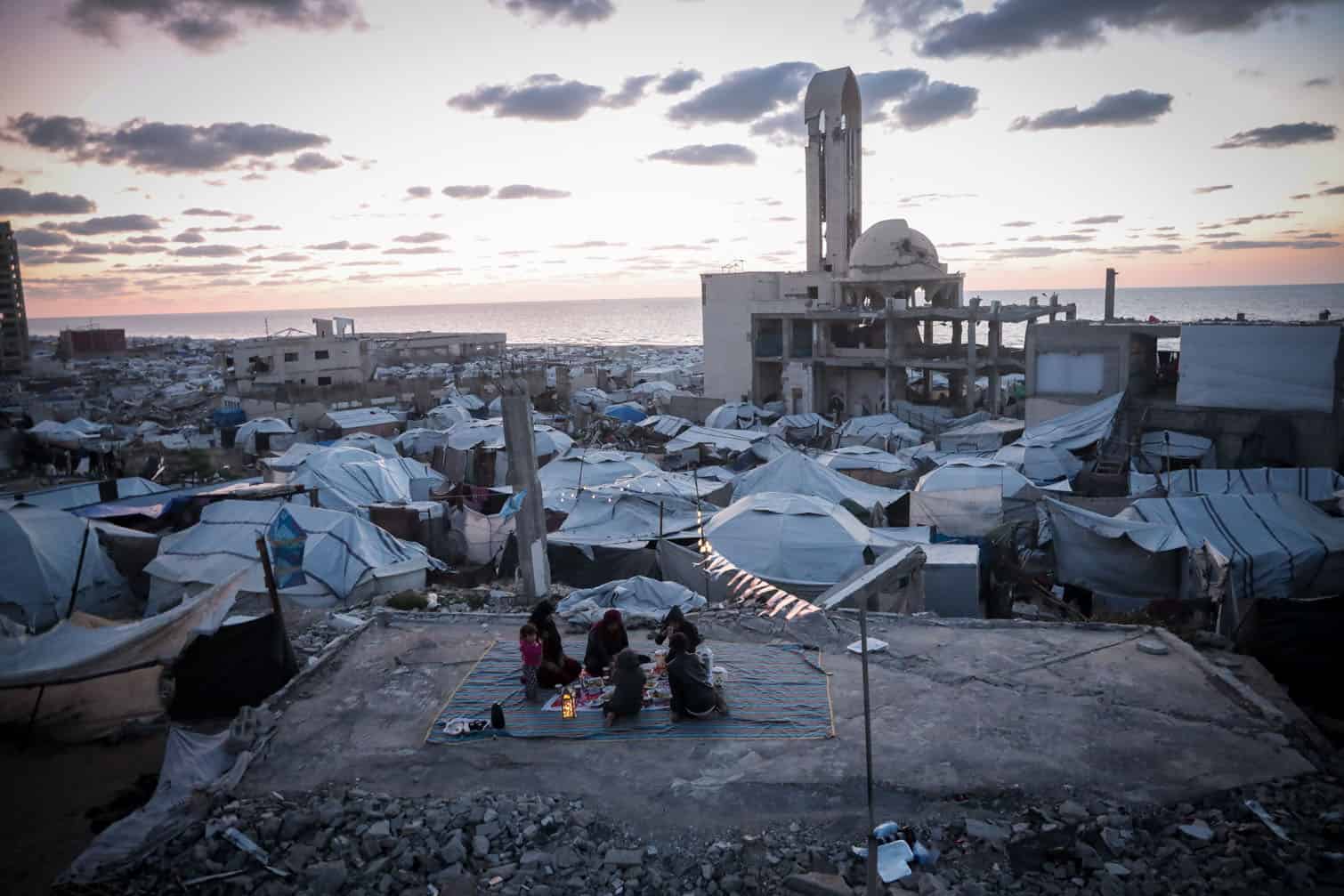 Palestinian family prepares iftar amid rubble of destroyed home in Gaza City