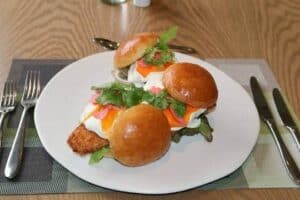 Recipe of the day: Mini panko-crumbed fish burgers with pickled carrot radish and coriander yoghurt
