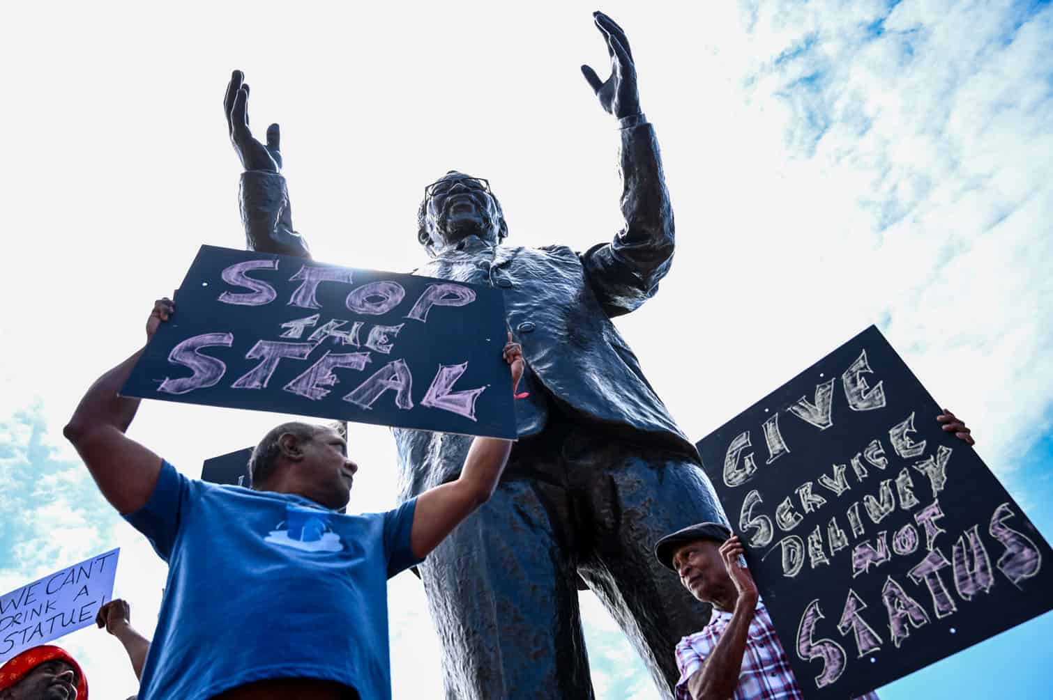 Various Groups Protest Outside The Unveiling Of A Statue At North Beach Precinct