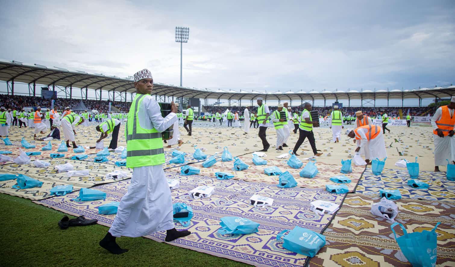 Volunteers arrange food parcels