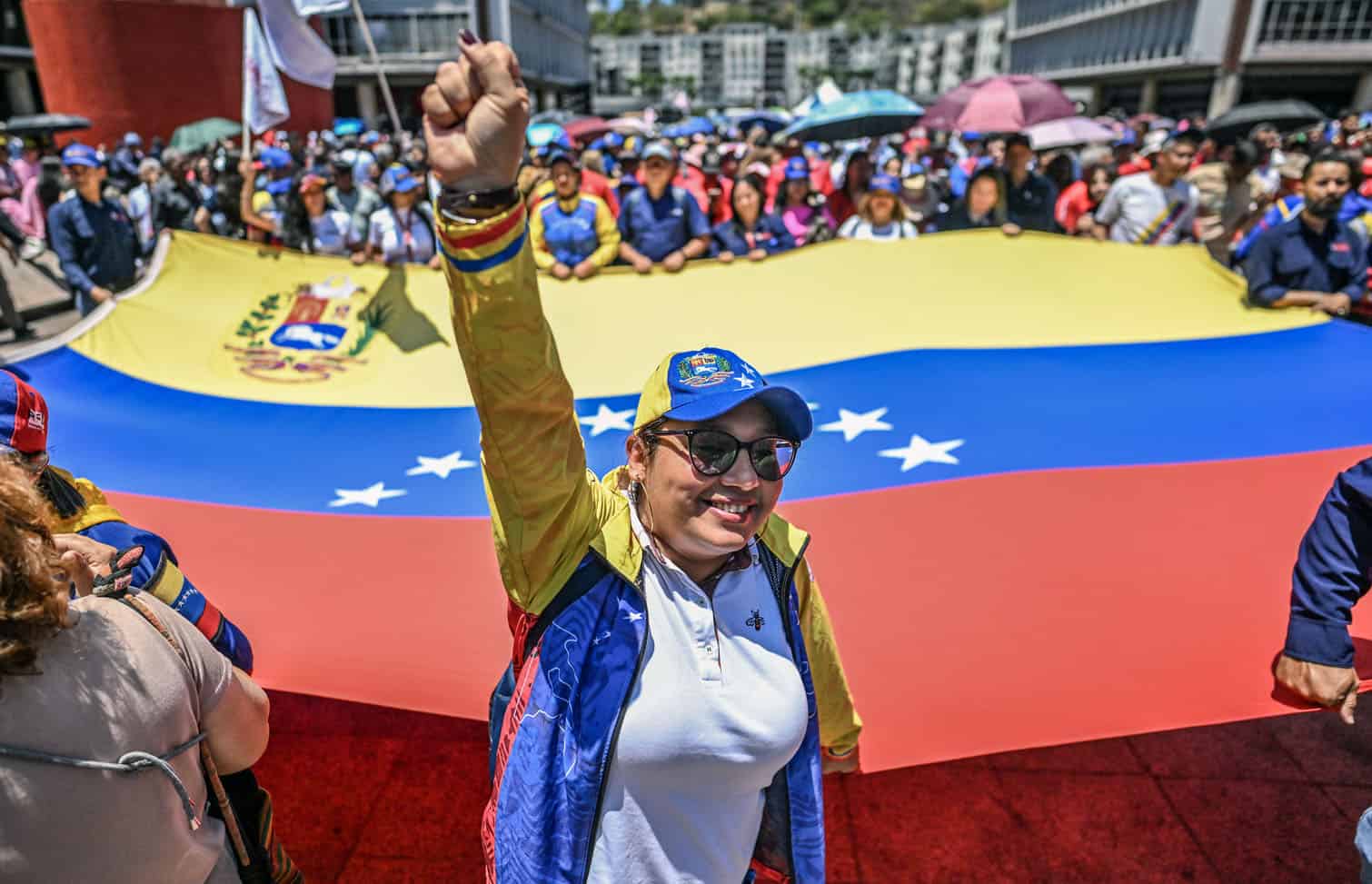 An activist raises her fist