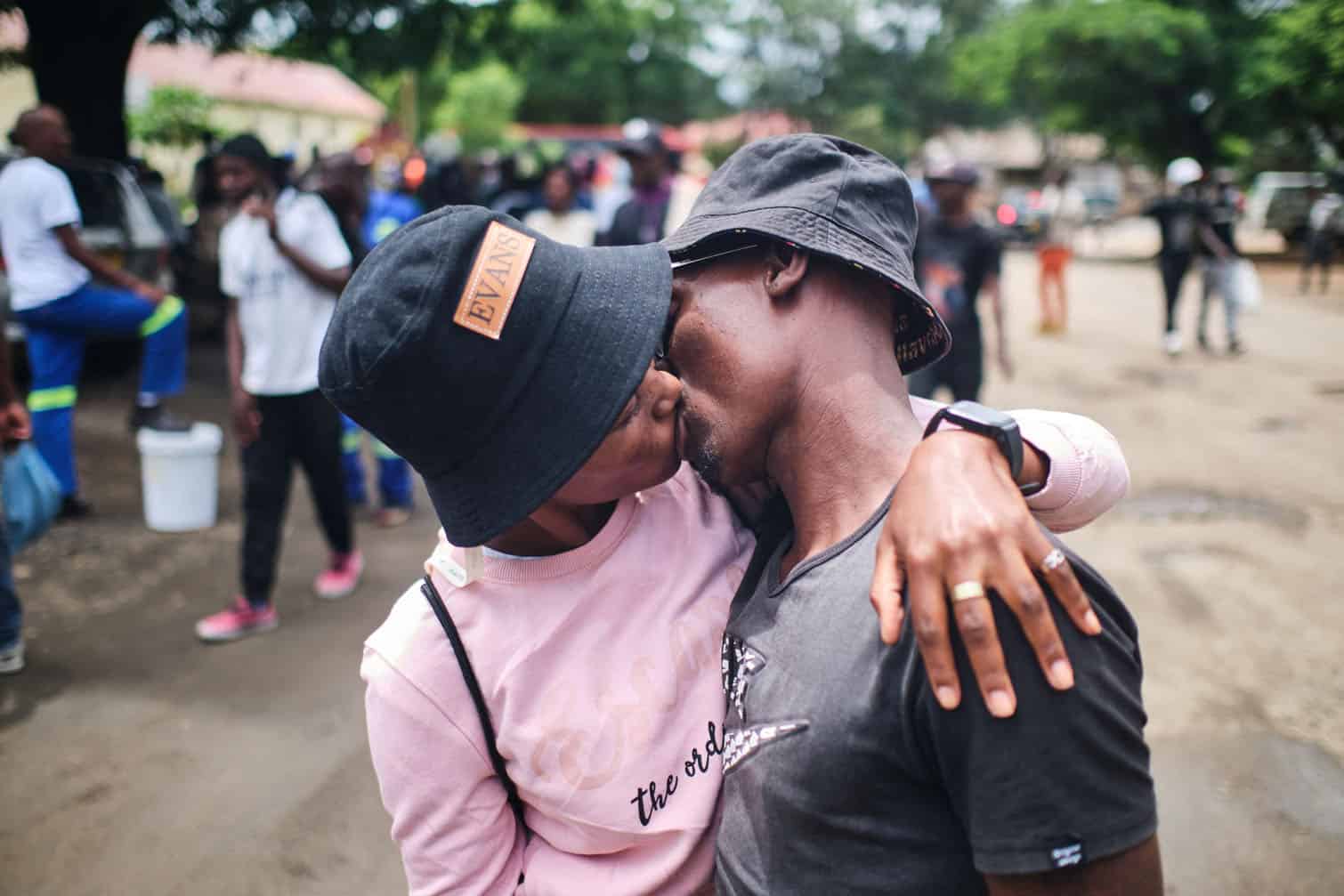 An inmate kisses his wife after walking out of prison
