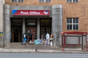 Post office workers march for bailout and salary increases
