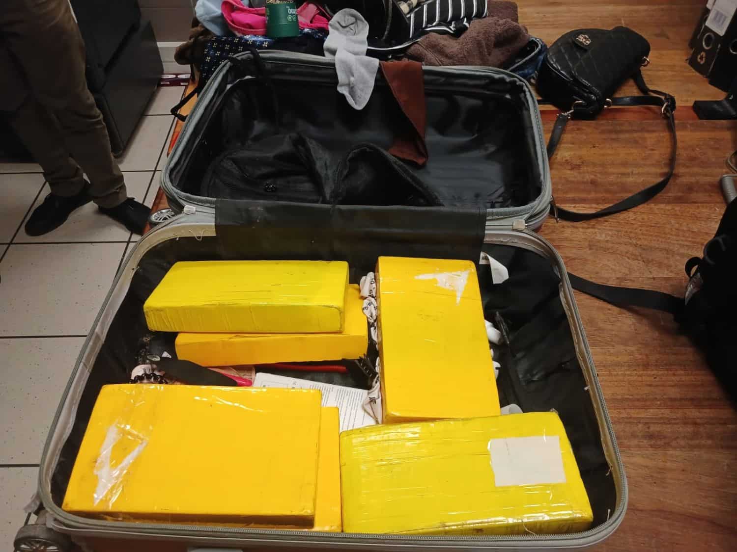 The cocaine was found wrapped and concealed inside the suspect's luggage. Picture: Supplied/Saps