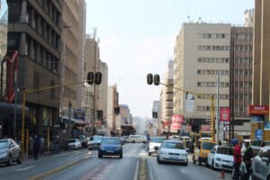 Economists speak on the dangers of ratings agency's negative watch.