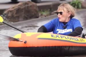 Helen Zille campaigning in Soweto in inflatable raft.
