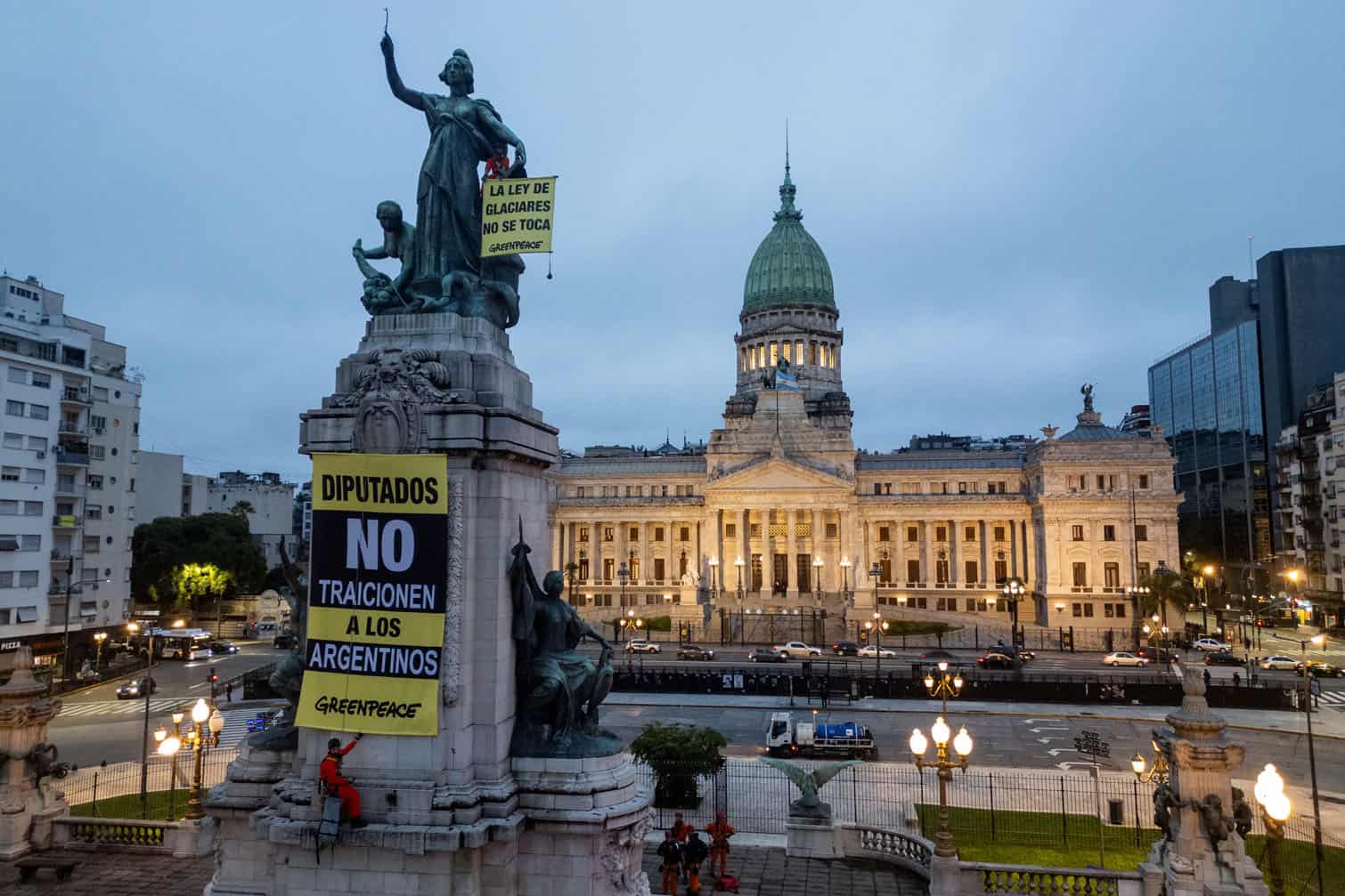 Greenpeace activists show banners