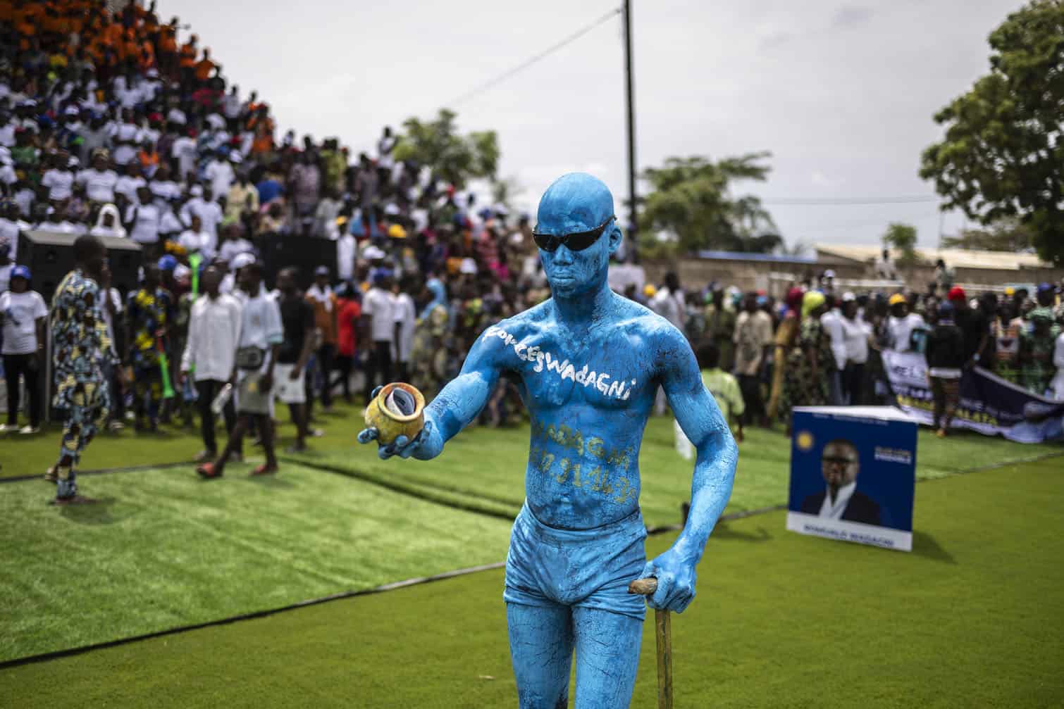 A supporter covered with body paint