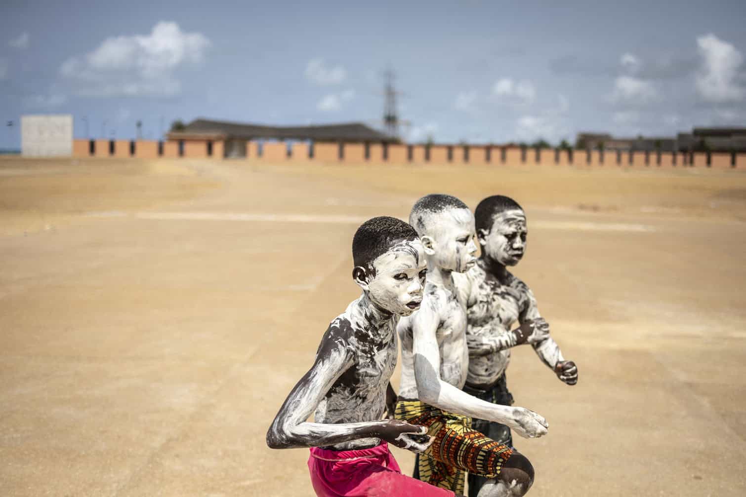 Children covered in white powder
