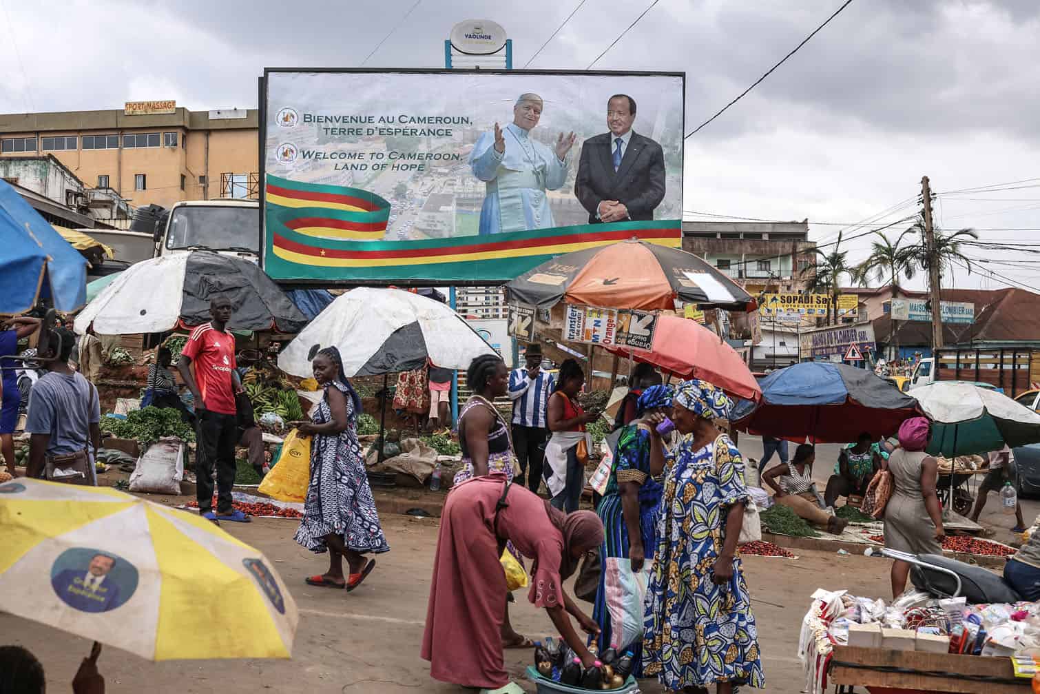 A general view of a billboard displaying portraits of Pope Leo XIV