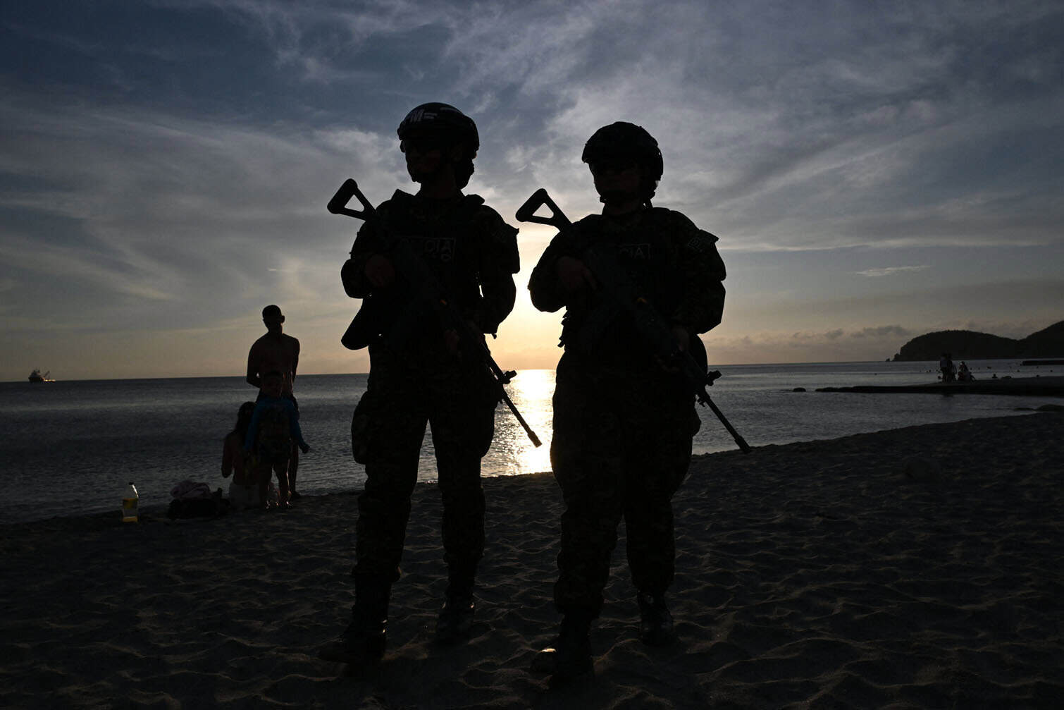 Colombian soldiers patroling the Pozos Colorados Beach