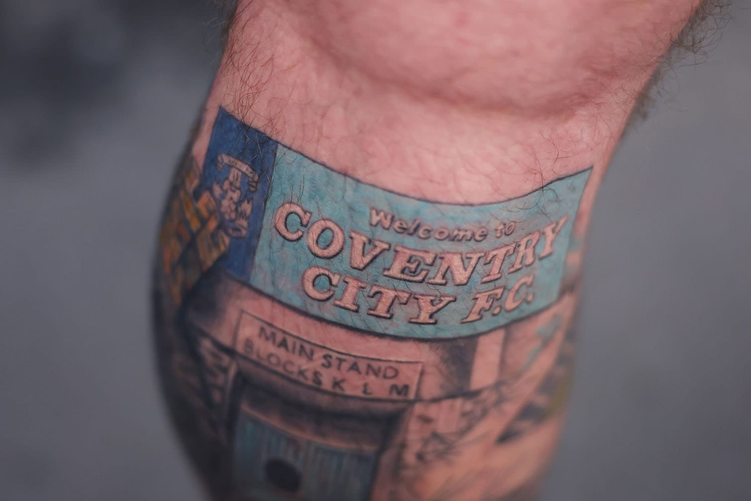 A tattoo is seen on the leg of a Coventry City fan