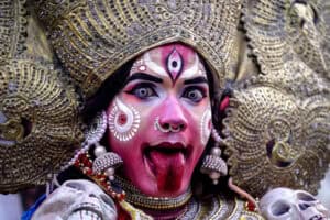 An artist dressed as the Hindu goddess 'Kali'