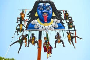 Tamil devotees suspended in air