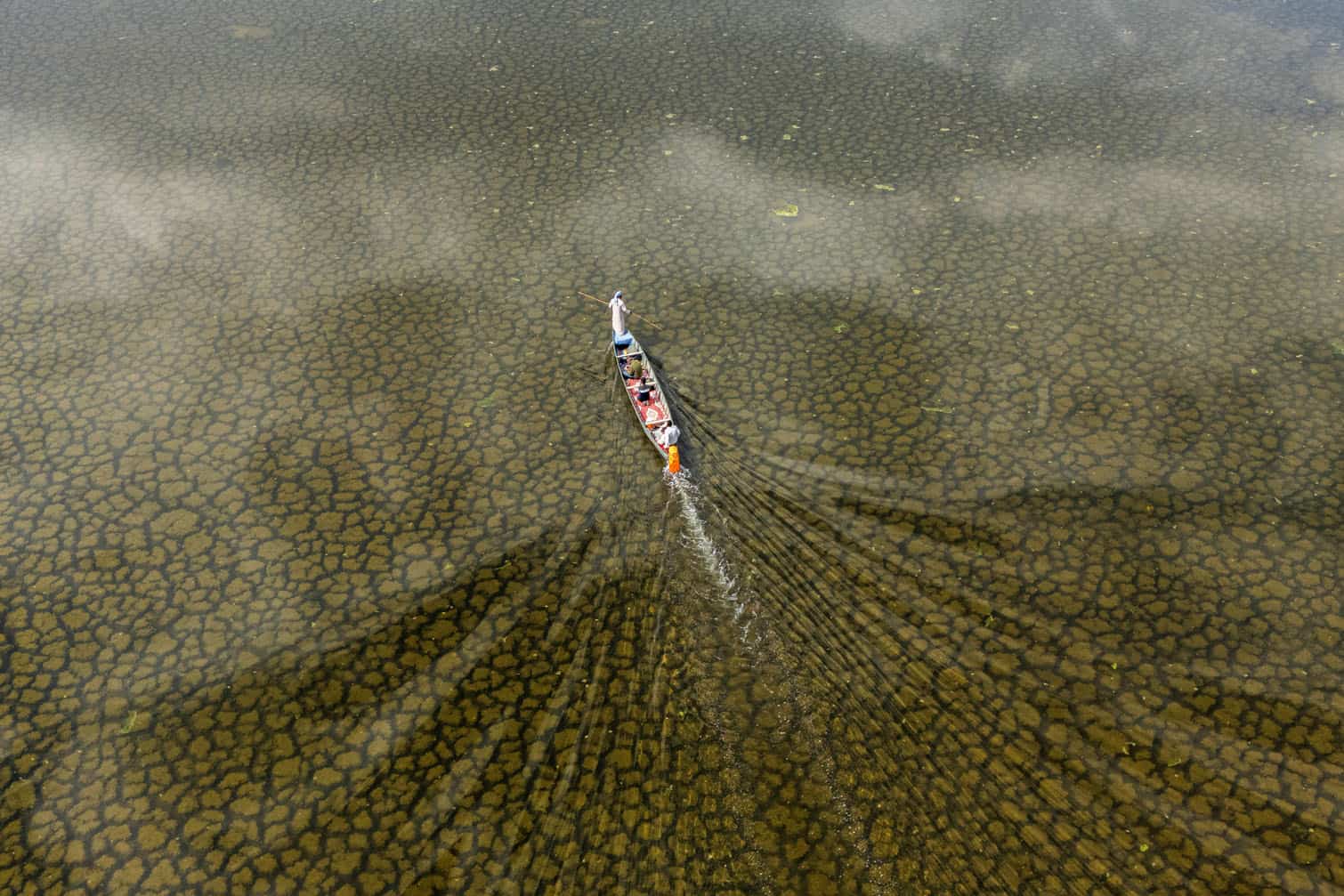 An aerial photograph of a local fishing boat