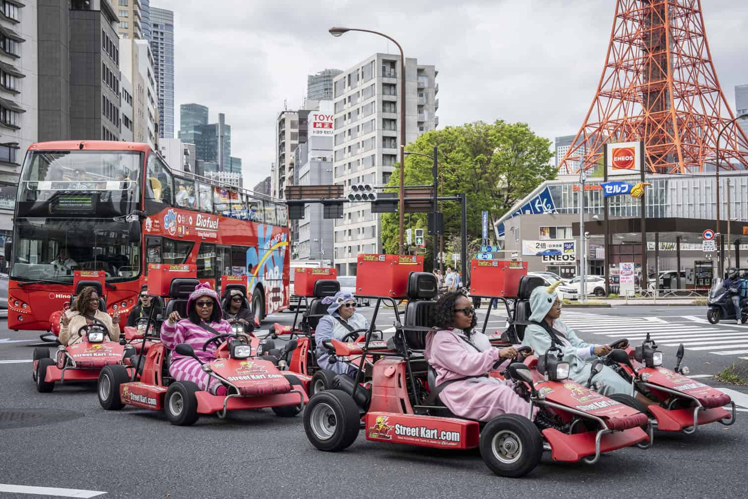Foreign tourists drive go-karts